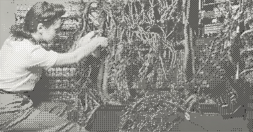 Image of a female IBM engineer configuring a computer